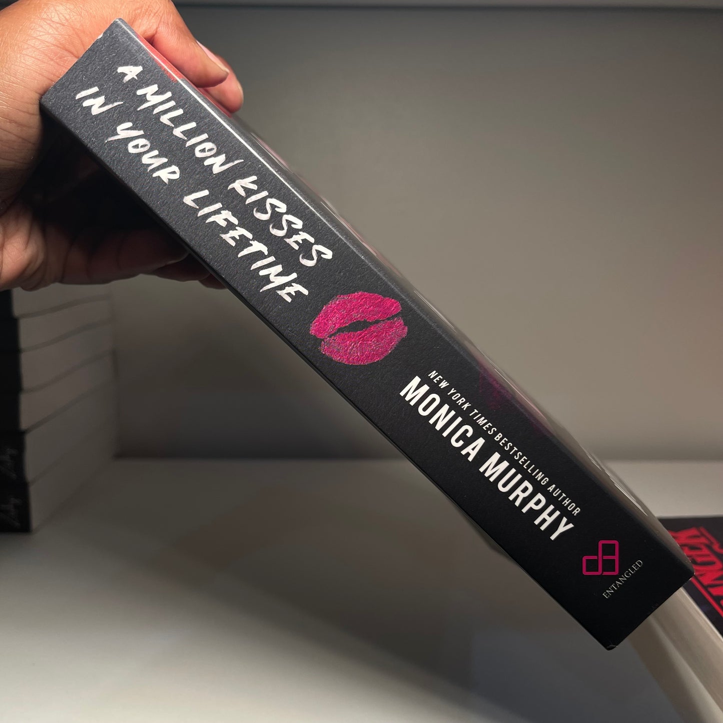 A Million Kisses in Your Lifetime: An Enemies-to-Lovers Paperback by Monica Murphy