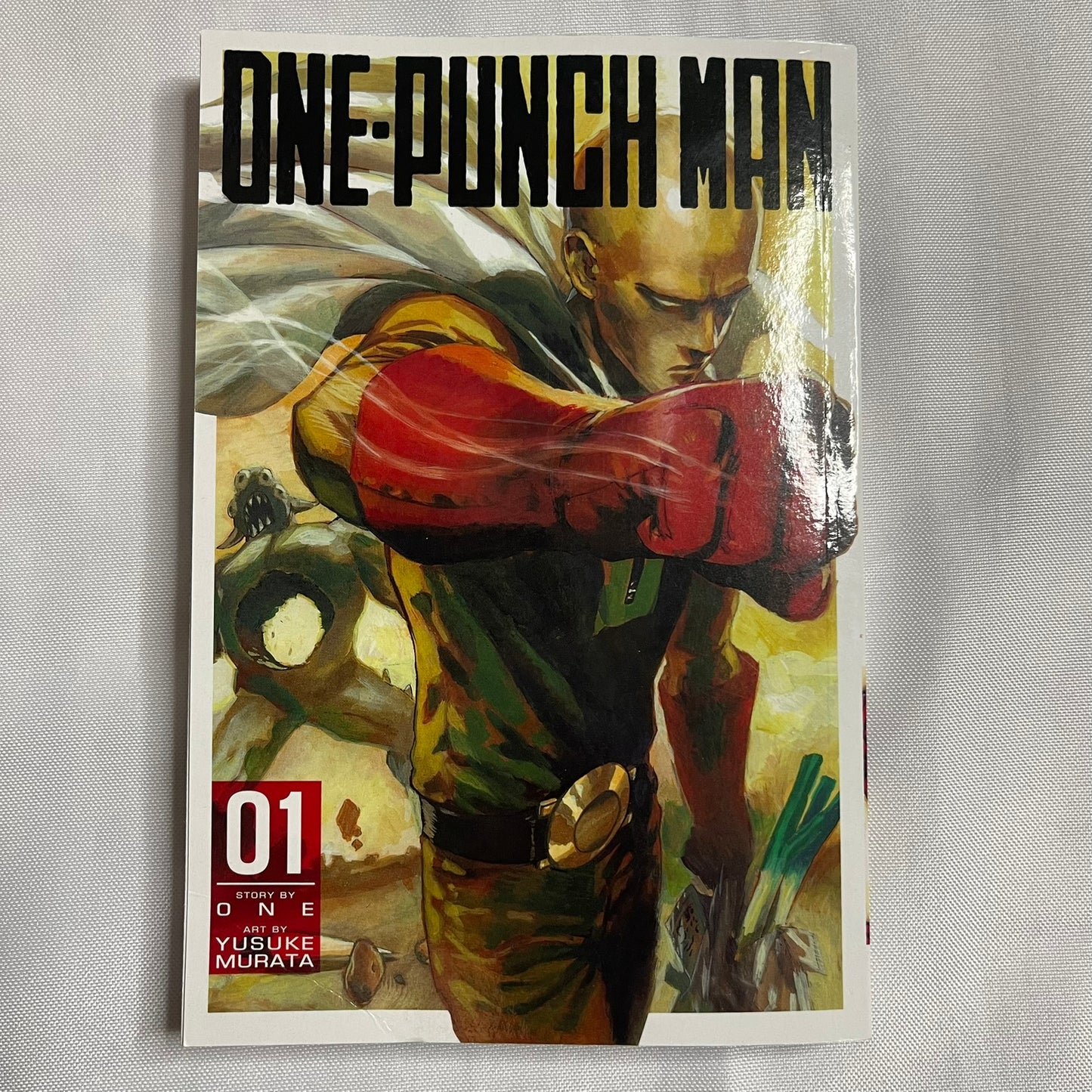 One-Punch Man Vol. 1 Paperback by ONE (Shonen Action)